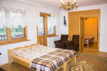 Фото номера Cемейный номер с собственной ванной комнатой Проживание в семье Hacjenda - Apartamenty i Pokoje Gościnne г. Чарна-Гура 16